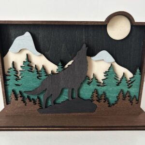 multi layered laser cut wolf scene